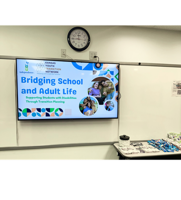 Photo of PPT slide from training. Title is Bridging School and Adult Life. Supporting Students with Disabilities through Transition Planning. 